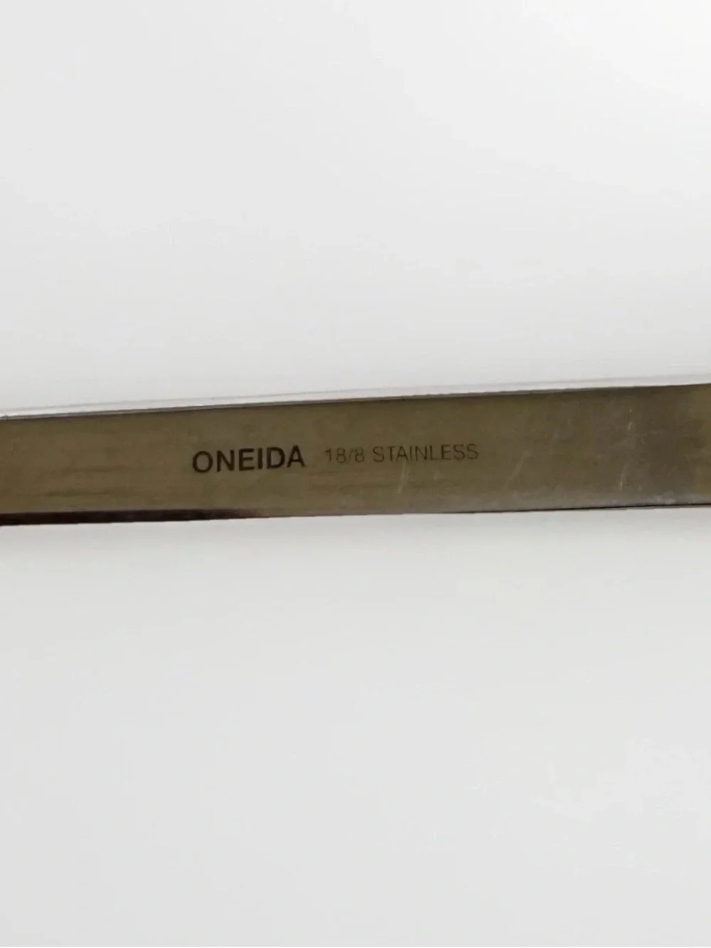 Oneida Mercutio Slotted Serving Spoon 18/8 Stainless Glossy Flared Tip